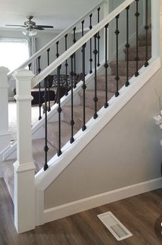 the stairs in this house are painted white