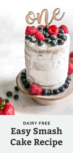 a cake with berries on top and the words, one dairy free easy smash cake recipe