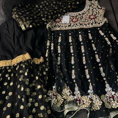 Selling Black Colored Pakistani Outfit. Includes A Beautiful Hand Beaded Dress With Embroidered Touches With Glittery Pants And Dupatta. The Dupatta (A Shawl-Like Scarf) Has A Gold Glittery Polkadot Pattern. Beautiful Black Pants With The Lower Part Having The Same Pattern As The Dupatta. Very Glittery And Great For A Party. It Is In New Condition With Tags. Never Worn. B&B Classic Fashion. Designer Bano Measurements Are Bust: 17 In Waist: 17 In Hip: 20 In Length: 34 In Black Sets For Evening Eid Celebration, Black Evening Sets For Eid, Black Dabka Work Party Dress, Black Party Dress With Dabka Work, Black Sequin Dress For Eid, Sleeveless Party Dress For Eid, Black Evening Dress With Dupatta, Black Zari Work Dress For Formal Occasions, Black Anarkali Dress With Sequins