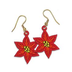 two red poinsettia flowers are hanging from gold earwires