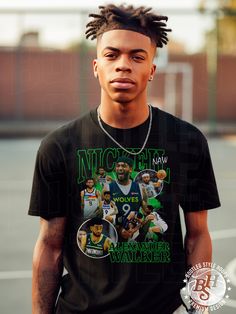 a man with dreadlocks standing in front of a basketball court wearing a t - shirt