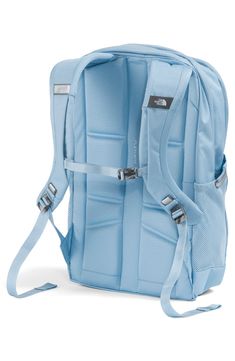 A roomy backpack holds everything you need for your morning commute or weekend adventure, featuring two large zip compartments, a padded laptop sleeve, an internal organization sleeve and an external bungee cord system. Molded straps are designed to fit a woman's proportions, providing all-day carrying comfort. Two-way zip-around closure. Top handle. Adjustable straps; removable sternum strap and hip belt. Mesh side pocket. Fits most 15" laptops. Polyester or nylon/polyester. By The North Face; Northface Backpacks, North Face Jester, Aesthetic Backpack, Morning Commute, Hip Belt, Lapis Blue, Bungee Cord, Blue Backpack, North Face Backpack