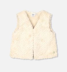 She’ll be oh-so-cozy layered up in our Faux Fur Vest Off White. Made from 100% poly faux fur with a rich texture, this vest features a sleeveless, boxy fit with a V-neckline and a small metal logo plate for brand distinction. Sleeveless Faux Fur Vest For Fall, Chic Faux Fur Vest For Fall, Chic Sleeveless Outerwear With Faux Fur Trim, White Faux Fur Vest, Baby Snowsuit, Faux Fur Vest, Faux Fur Vests, White Faux Fur, Dress Gift