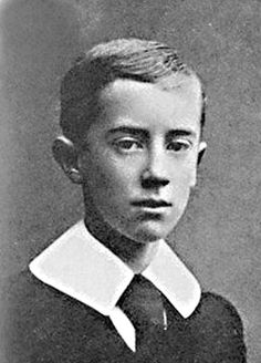 an old black and white photo of a young boy