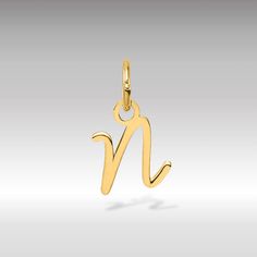 "They say, \"Simplicity is the ultimate sophistication,\" and the 14K Gold Script Letter \"N\" Initial Pendant embodies this sentiment flawlessly. Crafted with precision and finesse, this pendant features a minimalist script design that exudes understated elegance. Fashioned from high-quality 14-karat gold, it adds a touch of sophistication to any ensemble. The sleek script letter design of this pendant brings a personalized touch to your look. Whether you're dressing up for a special occasion or keeping it casual, the 14K Gold Script Letter \"N\" Initial Pendant effortlessly enhances your style with its timeless allure. Pair it with your preferred chain - whether it's a box, rope, cable, or wheat - to create a look that's both chic and versatile. Embrace the classic elegance of the 14K Go N Initial, Schrift Design, Script Design, Letter N, Letter Design, Script Lettering, Personalized Pendant, Initial Pendant, Understated Elegance