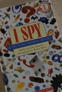 i spy picture riddle books are on the table