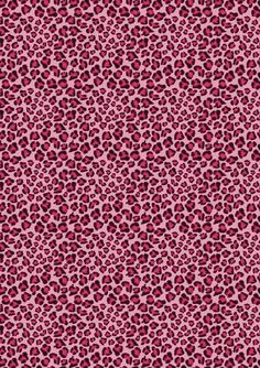 a pink and black animal print fabric with red spots on the bottom half of it