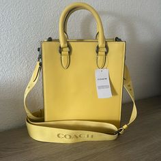 New With Tags! Gorgeous Yellow Coach Leather Crossbody Bag. Removable Straps To Wear As A Hand Purse. Check Out My Closet And Make Me An Offer! Yellow Coach Leather Bag, Coach Yellow Satchel Shoulder Bag, Coach Yellow Crossbody Shoulder Bag, Yellow Coach Shoulder Bag With Gold-tone Hardware, Yellow Coach Bag With Gold-tone Hardware, Hand Purse, Bags Coach, Coach Leather, Satchel Handbags