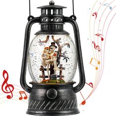 a snow globe with musical notes around it and an image of the skeleton in top hat