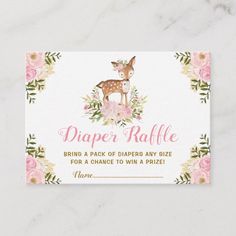 a pink and green floral baby shower tag with a deer on it's back