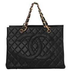 Chanel Quilted Black Caviar Skin Grand Shopper Chain Tote, Golden Hardware Chanel’s Grand Shopping Tote comes in durable black caviar leather and features Gold hardware, This stylish tote is crafted of diamond quilted caviar leather in black. This shoulder bag features leather threaded polished Gold chain-link shoulder straps , a prominent quilted Chanel CC logo on the front . The top is open to a partitioned black fabric interior with patch and zipper pockets , with very big open space, leaving you ample room for more than just your everyday items. This is a chic tote that is perfect for any occasion, only from Chanel! Measurements Base Length: 13.25 in Height: 9.75 in Width: 5.25 in Drop: 9 in Material: Caviar Color: Black Exterior Features: Double shoulder straps, open top, gold tone ha Un Logo, Black Caviar, Chanel Bags, Black Tote, Black Purses, Shopping Tote Bag