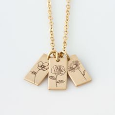 "Keep your little ones close to your heart with this Birth Month Flower Necklace! It's great for layering, a wonderful minimalist piece, perfect gift for your wife, friend, Baby Shower Gift, Mother's Day gift or simply to treat yourself! Engraved and hand assembled with care and love, it comes in 14k gold fill, rose gold fill, or sterling silver. HOW - TO - ORDER 1. Select your options from the drop down menu see photo for font styles and symbol options 2. Chain length options are 16\", 18\" &am Mother's Day Flower Charm Necklaces, Everyday Flower Charm Necklace For Mother's Day, Dainty Stamped Charm Necklaces For Mother's Day, Stamped Charm Necklaces For Mother's Day, Nana Necklace, Code Morse, Morse Code Necklace, Birth Flower Necklace, Bonus Mom