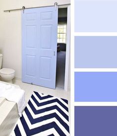 a bathroom with blue and white colors in it