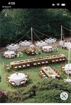 an outdoor wedding reception setup with tables and chairs