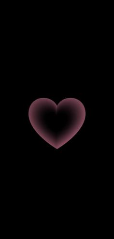 a heart shaped object in the dark