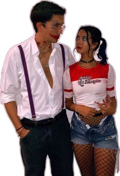 a man standing next to a woman wearing fishnet stockings and suspenders on her chest