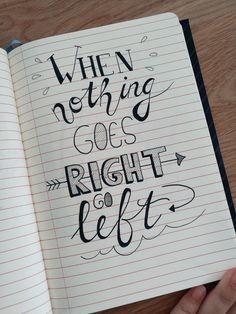 an open notebook with writing on it that says when nothing goes right, let's