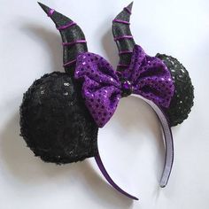 an image of a mouse ears with purple and black sequins