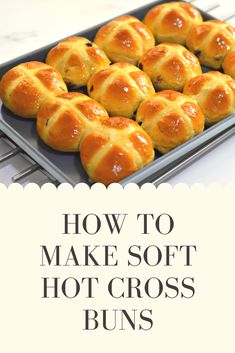 hot cross buns on a baking sheet with the words how to make soft hot cross buns