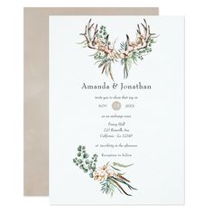 a wedding card with antlers and flowers on it