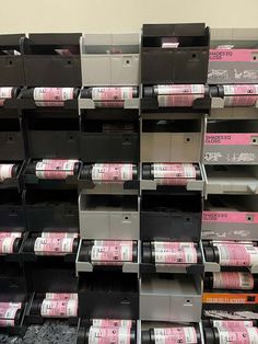 several stacks of pink and black file cabinets