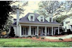 a large white house with columns and windows