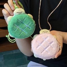 ♥ This melon bread turtle mini pouch is perfect to carry small goods such as AirPods, earphones, coins, credit cards, lip balm, lipstick, and anything you would like around places, and the cute turtle design will always be a plus! 🔎 PRODUCT DETAILS:  ♥ Type: Type: Mini Pouch (Lanyard shown in the product photos are included) ♥ Size (W x H x D):  10 cm x 12 cm ♥ Lanyard Length: About 57 cm ♥ Material: Polyester   ⚠️ WARNING:  ♥ Mild hand wash and air dry only when needed. Please DO NOT put it in WASHER or DRYER. ✉️ SHIPPING:  ♥ All orders will be shipped as First-class Package WITH TRACKING. ♥ Shipping address: Please make sure your shipping address is correct. We will not be able to make any changes after the order is shipped. ❗ ISSUES/FEEDBACK:  ♥ If you have any concerns or problem with