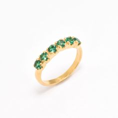 Half Eternity Ring set with a Create Emerald in a flawless diamond cut, clarity & color, 3mm each (1 Carat all), Band width 2mm. Gold Eternity Ring design - Gold Vermeil: 18k Gold Plating on Solid 925 Sterling Silver. Matching Pendant: www.etsy.com/uk/listing/924734324 Matching Earrings - please ask me More stackable options: Opal: www.etsy.com/listing/730548123 Opal, diamond cut: www.etsy.com/listing/716510914 Emerald: www.etsy.com/listing/730366165 Sapphire: www.etsy.com/listing/719942942 Garn Green Prong-set Eternity Band For Promise Ring, Emerald Ring With Vvs Clarity And Round Band, Emerald Stackable Rings With Prong Setting, Emerald Eternity Band With Prong Setting Gift, Emerald Eternity Band With Prong Setting, Emerald Half Eternity Ring For Promise, Emerald Eternity Band Ring, Green Diamond Ring, Green Diamond Rings