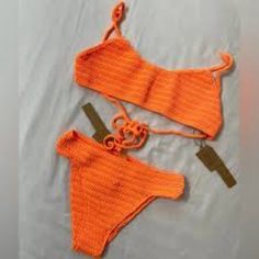 Skims Women's Orange Crochet Swim 2-Piece Bikini Swimwear Brand: Skims Department: Women's Style: Bikini Size: 4x Color: Orange Neckline: Scopp Neck Sleeve Type: Sleeveless Sleeve Bottom: Low-Rise Top: Triangle Top Pattern: Solid Material: 90% Recycled Nylon 10% Spandex Condition: New With Tags Features: - Stretchy Material - Flattering! - Classic Triangle Bikini Top - Crochet Ties At Neck And Back For Adjustability - Hand Knitted - Dipped Front - Gusset Lining - Stretchy Top That Feels Like Par Orange Seamless Beachwear Swimwear, Orange Seamless Swimwear For The Beach, Orange Seamless Swimwear For Vacation, Orange Seamless Swimwear For Beach, Seamless Orange Beach Swimwear, Crochet Swim, Triangle Top, Stretchy Tops, Swimwear Brands