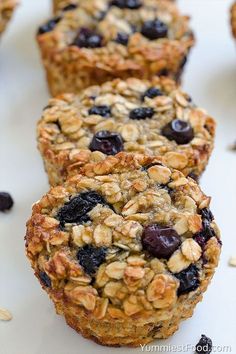 three blueberry oatmeal muffins sitting on top of each other