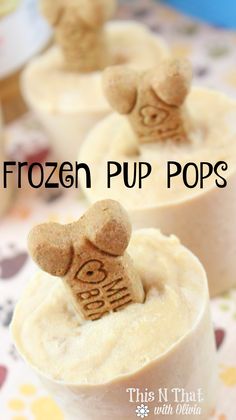 two cups filled with frozen pup pops on top of a table