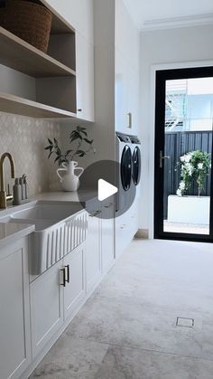 the kitchen is clean and ready to be used as a laundry room or office space