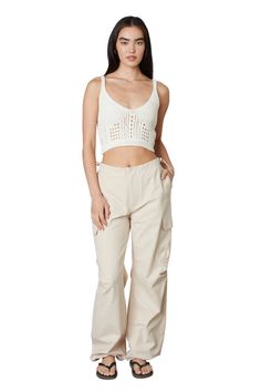 The parachute pant trend is not over yet! The Ludlow Parachute Pant in tan is the trendiest pant for any occasion! Featuring a drawstring waist, and cargo inspired pockets, these mid-rise pants are the perfect mix of comfortable and cute! Pair with... Parachute Pant, Pants Gift, Trendy Pants, Pant Trends, Hoodie Fits, Pants Large, Swim Fashion, How To Look Classy, Drawstring Waistband