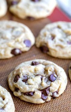 chocolate chip cookies on a baking sheet ready to be eaten