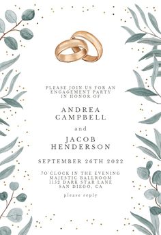 an elegant wedding card with gold rings and eucalyptus leaves