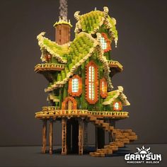 a house made out of bananas and other things in the shape of trees is shown