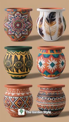 four vases with different designs on them, all painted in different colors and patterns