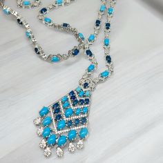 Only One In Stock. Stunning. Silver Tone Metal, Plated. Glass And Cubic Zirconias. Necklace Is 31 Inches. Blue Crystal Jewelry With Rhinestones, Elegant Turquoise Jewelry With Rhinestones, Blue Crystal Rhinestone Costume Necklace, Party Turquoise Necklace With Rhinestones, Elegant Blue Rhinestone Necklace With Sparkling Stones, Elegant Blue Crystal Rhinestone Necklace, Blue Party Necklace With Bling, Blue Crystal Necklaces With Bling, Blue Necklaces With Sparkling Stones For Party