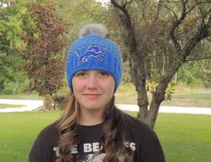 **This listing is for a Detroit Lions inspired handmade crochet beanie hat with pom pom. It will be custom made for you. I don't carry any in stock! If you need it sooner then my current construction time please message me PRIOR to ordering to see if I can get it out to you in time SHIPPING **PLEASE SEE SHOP ANNOUNCEMENT FOR MY CURRENT CONSTRUCTION AND SHIPPING TIME FRAME! The shop announcement is located on my shops home page https://www.etsy.com/shop/LayneCouture Sizes available- PLEASE SPECIFY * 8 Years - Adult All my items are constructed with love in my smoke-free home. I use machine washable and dryable 100% acrylic yarn. I recommend hand-washing and laying flat to dry after reshaping. I Please feel free to contact me with any questions! LIKE US ON FACEBOOK FOR COUPONS AND GIVEAWAYS Detroit Lions Crochet Hat, Beanie With Pom Pom, Bonnet Au Crochet, Hat With Pom Pom, Beanie With Pom, Bonnet Crochet, Crochet Beanie Hat, Pom Pom Hat, Skull Cap Beanie