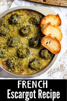 a bowl of food with bread on the side and french escargot recipe