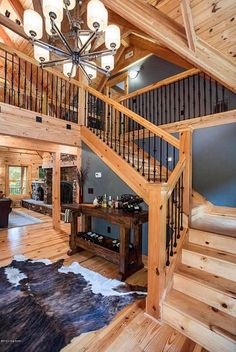 a living room filled with furniture and a spiral staircase