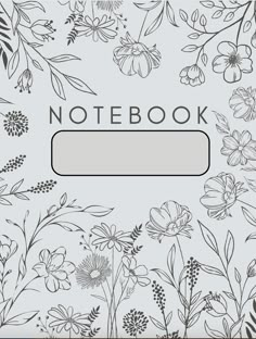 a notebook with flowers and leaves on the cover, which is blank for text or an image