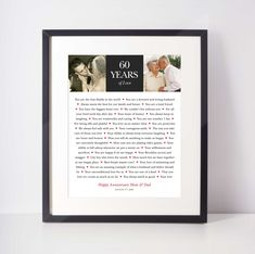 an anniversary poem is displayed in a black frame