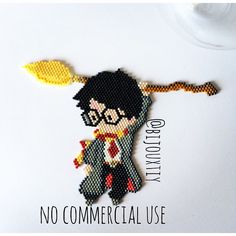 a cross - stitch pattern of a boy with glasses and a bat on his shoulder