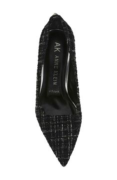 A pointy toe elongates this timeless pump that's lofted by a sculpted heel. Textile upper and lining/rubber sole Imported Anne Klein, Women's Pumps, Nordstrom Rack, Rubber Sole, Nordstrom, Pumps, Black White, Size 6, Black And White