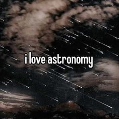 the words i love astronomy against a night sky with stars and clouds in the background