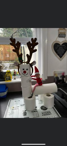 a toilet paper roll with a reindeer on it