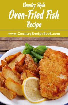 a white plate topped with fried fish next to green beans and lemon wedged potatoes