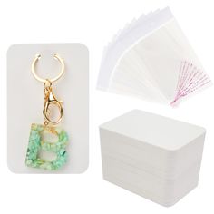 PRICES MAY VARY. Package Include: 100 x Keychain Display Cards, 100 x Self-Sealing Bags. Product Size: Each cards measures 3 x 4.7 in/7.5 x 12 cm, each clear bags measures 3.5 x 5.5 in/9 x 14 cm. Material: Our keychain place cards are made of quality art paper with pre-cut holes, which is not only sturdy, but also not easy to bend and break. These cards are thick enough to be written and not easy for ink to pass through. Unique Design: This keychain card is improved and designed by TEMLUM. We in Business Card Organizer, Keychain Display, Black Keychain, Jewelry Display Cards, Packaging Supplies, Clear Bags, Business Card Holders, Display Cards, Jewelry Holder