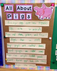 a bulletin board with piggies written on it and other words in front of the board